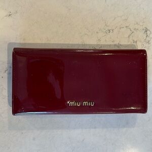 Miu Mui red patent leather continental wallet